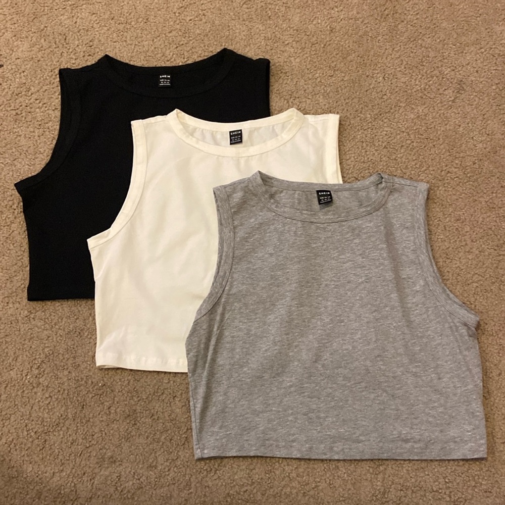 Three crop tops (sold together)
Size: XL